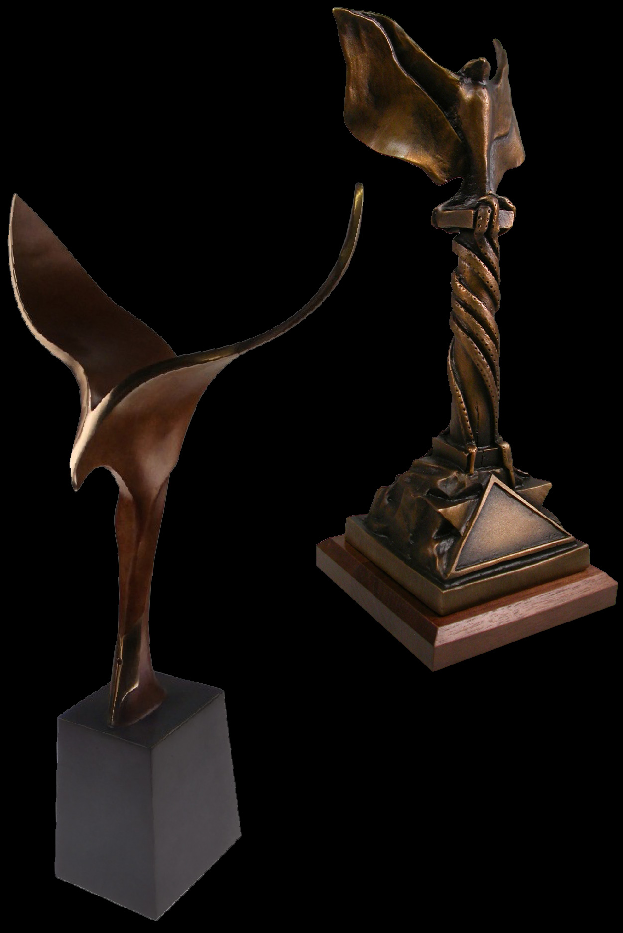 two bronze eagles in flight